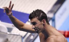 El nadador nortemericano, Michael Phelps, celebra la clasificación a la gran final de los 100 metros mariposa y este martes buscará su medalla 24 y su dorada 20.