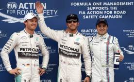 Lewis Hamilton posando con Nico Rosberg y Felipe Massa. (Foto: AGENCIA AFP)