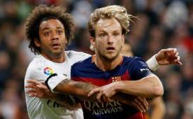 Marcelo sufrió con los constantes desbordes del Barcelona. Foto EFE.