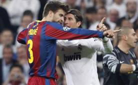 Piqué y Sergio Ramos son rivales en los clásicos y compañeros en España.