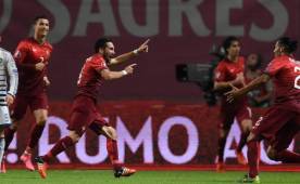 Momento en el que Joao Moutinho celebra el gol del triunfo de Portugal sobre Dinamarca. FOTO: AFP
