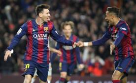 Messi celebra uno de los goles junto con Neymar en el último partido ante el Atlético.