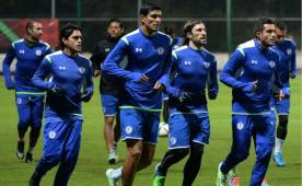 Julio Dominguez (R) of Cruz Azul celebrates with his teammates a goal against Tijuana during the Mexican Clausura football tournament match at the Azteca stadium in Mexico City, on March 07, 2020. (Photo by RODRIGO ARANGUA / AFP)