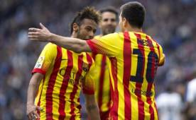 Messi celebra con Neymar su primera anotación en el estadio Cornellá-El Prat. (Foto: EFE)
