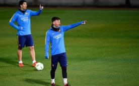 Suárez y Messi durante el entrenamiento en Japón. Foto EFE