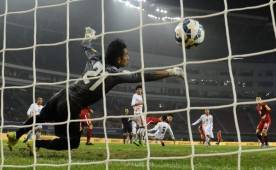 El portero de Bután, Hari Gurung, fue la víctima de los chinos en esta jornada eliminatoria.