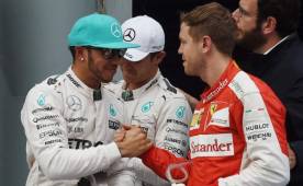 Lewis Hamilton y Sebastian Vettel liderarán el Gran Premio de Malasia. (AFP)