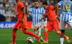 Messi no tuvo espacios, la defensa del Málaga anuló el ataque del Barcelona. Foto AFP