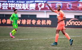 El delantero hondureño Eddie Hernández celebrando su segundo gol en China.