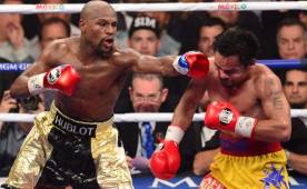 Luego de vencer a Pacquiao, Mayweather aseguró que renunciaría a sus títulos y no lo hizo. Tampoco pagó a la OMB y podría perder el cinturón de peso welter. Foto AFP