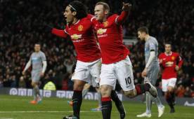 Falcao le dio el pase del primer gol a Rooney. Acá el Tigre festejando con Wayne. (AFP)