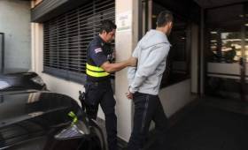 David Guzmán fue trasladado a la fiscalía para que emitiera su declaración acerca de lo sucedido. (Foto: Alonso Tenorio - Nación)