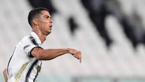 Juventus' Portuguese forward Cristiano Ronaldo reacts during the UEFA Champions League round of 16 second leg football match between Juventus and Olympique Lyonnais (OL), played behind closed doors due to the spread of the COVID-19 infection, caused by the novel coronavirus, at the Juventus stadium, in Turin , on August 7, 2020. (Photo by Miguel MEDINA / AFP)