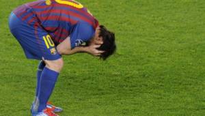 Barcelona's Argentinian forward Lionel Messi holds his head in his hands after losing to Chelsea after the UEFA Champions League second leg semi-final football match Barcelona against Chelsea at the Cam Nou stadium in Barcelona on April 24, 2012. AFP PHOTO / PIERRE-PHILIPPE MARCOU (Photo credit should read PIERRE-PHILIPPE MARCOU/AFP/Getty Images)