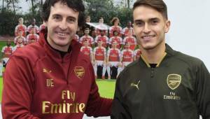 Unai emery, técnico del Arsenal, junto al mediocampista Denis Suárez.