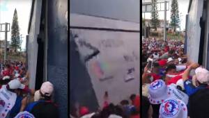 Aficionados captaron el momento en el que seguidores del Olimpia intentaron derribar uno de los portones del estadio Nacional.