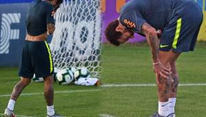 El delantero brasileño Neymar se lamenta durante la práctica pero los médicos que lo observaron dicen que no es peligroso.