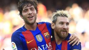 Sergi Roberto festejando junto con Messi.
