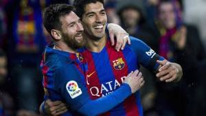 Messi celebrando junto a Suárez en un partido con el Barca.
