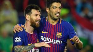 Suárez celebrando junto con Messi.