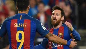 Messi celebrando junto a Luis Suáre con el Barcelona.