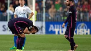 Leo Messi no tuvo su tarde. La defensa del Málaga no anuló los 90 minutos. Fotos AFP