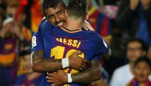 Paulinho y Messi festejando juntos en el Barcelona.