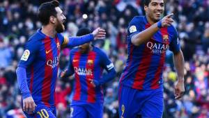 Messi celebrando junto a Luis Suárez.