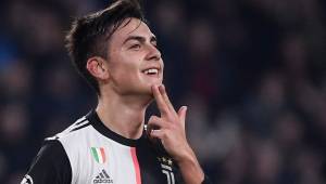 Juventus' Argentine forward Paulo Dybala celebrates after opening the scoring during the UEFA Champions League Group D football match Juventus Turin vs Atletico Madrid on November 26, 2019 at the Juventus Allianz stadium in Turin. (Photo by Marco Bertorello / AFP)