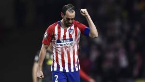 Atletico Madrid's Uruguayan defender Diego Godin celebrates after scoring his team's second goal during the UEFA Champions League round of 16 first leg football match between Club Atletico de Madrid and Juventus FC at the Wanda Metropolitan stadium in Madrid on February 20, 2019. (Photo by OSCAR DEL POZO / AFP)