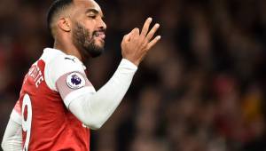 Arsenal's French striker Alexandre Lacazette celebrates scoring his team's second goal during the English Premier League football match between Arsenal and Newcastle United at the Emirates Stadium in London on April 1, 2019. (Photo by Glyn KIRK / AFP) / RESTRICTED TO EDITORIAL USE. No use with unauthorized audio, video, data, fixture lists, club/league logos or 'live' services. Online in-match use limited to 120 images. An additional 40 images may be used in extra time. No video emulation. Social media in-match use limited to 120 images. An additional 40 images may be used in extra time. No use in betting publications, games or single club/league/player publications. /