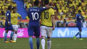 Brazil's Neymar (L) and Colombia's James Rodriguez talk during their 2018 World Cup qualifier football match in Barranquilla, Colombia, on September 5, 2017. / AFP PHOTO / Luis ACOSTA