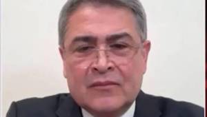 Juan Orlando Hernández al momento de la entrevista con el medio OANN. Foto captura de imagen.