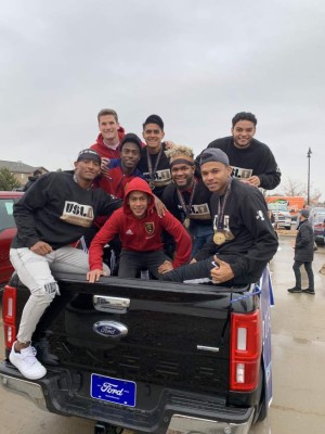 Douglas Martínez, Cristian Cálix y Luis Palma celebran el título con el Real Monarchs en Utah