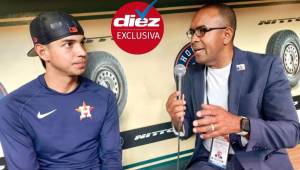 Philep Clark habló con el hondureño Mauricio Dubón en el estadio de los Astros de Houston.