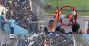 ¡ZAFARRANCHO EN EL ESTADIO NACIONAL! Así se vivió la espantosa pelea entre miembros de la barra del Motagua con la policía en sol norte. FOTOS: Emilio Flores | José Vásquez.