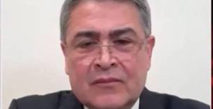 Juan Orlando Hernández al momento de la entrevista con el medio OANN. Foto captura de imagen.