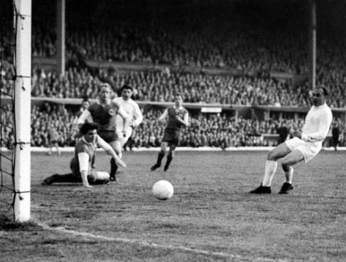 FILE PHOTO: Alfredo Di Stefano has been placed in an induced coma after suffering a heart attack. Football, 18th May 1960, Hampden Park, Glasgow, Scotland, European Cup Final, Real Madrid 7 v Eintracht Frankfurt 3, Real Madrid Centre-Forward Alfredo Di Stefano (right) scores the first goal of the final (Photo by Popperfoto/Getty Images)