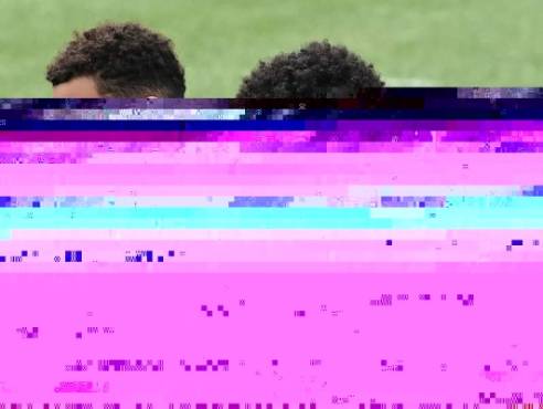 (FILES) In this file photo taken on June 05, 2021 (LtoR) Germany's midfielder Jamal Musiala and midfielder Serge Gnabry attend a training session in Seefeld, Austria, ahead of the European football championship 2020-2021. - After unvaccinated national player and Bayern midfielder Joshua Kimmich, his teammates Serge Gnabry, Jamal Musiala, Eric Maxim Choupo-Moting and Michael Cuisance also have to quarantine 'in consultation with the responsible health authorities', Bayern Munich announced on November 21, 2021, two days before the Champions League match against Dynamo Kiev. (Photo by Christof STACHE / AFP)