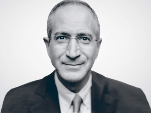 NEW YORK, NY - NOVEMBER 01: Director of SEO Sean Kainec (C) accepts the Digital Knowledge Innovator of the Year award on behalf of Comcast from Yext Co-Founder & President Brian Distelburger and Yext EVP of Partner Jonathan Cherins onstage at the ONWARD17 Conference- Day 1 on November 1, 2017 in New York City. Brad Barket/Getty Images for ONWARD17/AFP