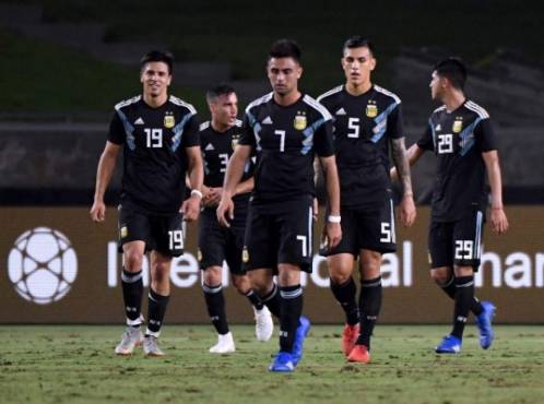 LOS ANGELES, CA - SEPTEMBER 07: Giovanni Simeone #19 of Argentina smiles as he walks back after his goal to take a 3-0 lead over Guatemala at Los Angeles Memorial Coliseum on September 7, 2018 in Los Angeles, California. Harry How/Getty Images/AFP