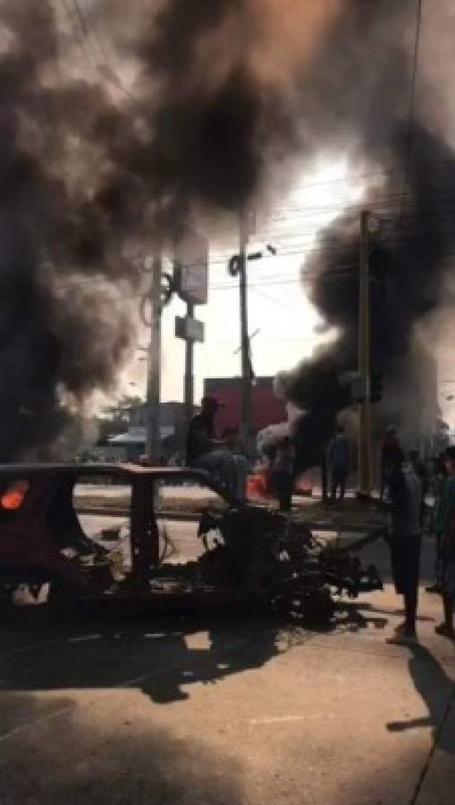 Protestas en Choloma pidiendo comida: Intentos de saqueos y quema de vehículos