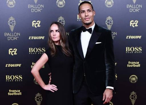 Liverpool's Dutch defender Virgil van Dijk and his wife Rike Nooitgedagt (L) arrive to attend the Ballon d'Or France Football 2019 ceremony at the Chatelet Theatre in Paris on December 2, 2019. (Photo by Anne-Christine POUJOULAT / AFP)