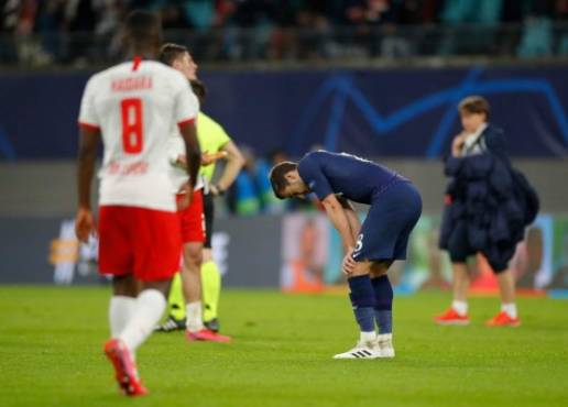 Tottenham Hotspur's English midfielder Harry Winks reacts after the UEFA Champions League football match between RB Leipzig and Tottenham Hotspur, in Leipzig, eastern Germany on March 10, 2020. (Photo by Odd ANDERSEN / AFP)