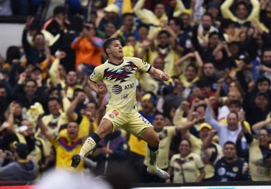 $!America's Richard Sanchez celebrate after scoring against Monterrey during their Mexican Apertura Tournament football final at the Azteca stadium in Mexico City, on December 29, 2019. (Photo by RODRIGO ARANGUA / AFP)