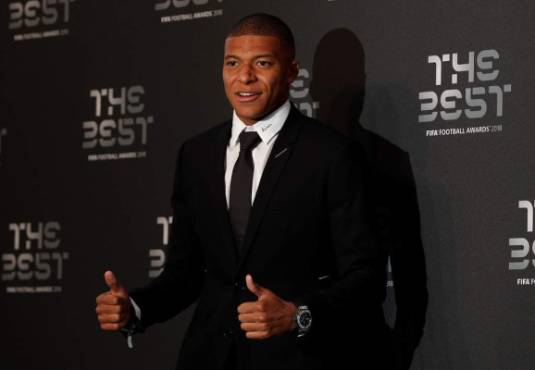Paris Saint-Germain and France forward Kylian Mbappe arrives for The Best FIFA Football Awards ceremony, on September 24, 2018 in London. / AFP PHOTO / Adrian DENNIS