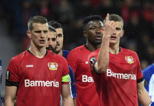 Leverkusen's German midfielder Lars Bender (L) and Leverkusen's German defender Sven Bender react during the Europa League last 32 first leg football match between Bayer Leverkusen and FC Porto in Leverkusen on February 20, 2020. (Photo by Ina FASSBENDER / AFP)
