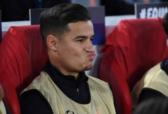 Liverpool's Brazilian midfielder Philippe Coutinho looks on before the UEFA Champions League Group E football match between Liverpool and Sevilla at Anfield in Liverpool, north-west England on September 13, 2017. / AFP PHOTO / Paul ELLIS