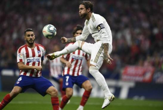 Real Madrid y Atlético se miden por el liderato de la Liga de España. FOTO: AFP.