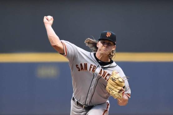 MILWAUKEE, WISCONSIN - JULY 12: Shaun Anderson #64 of the San Francisco Giants pitches during the first inning against the Milwaukee Brewers at Miller Park on July 12, 2019 in Milwaukee, Wisconsin. Stacy Revere/Getty Images/AFP
